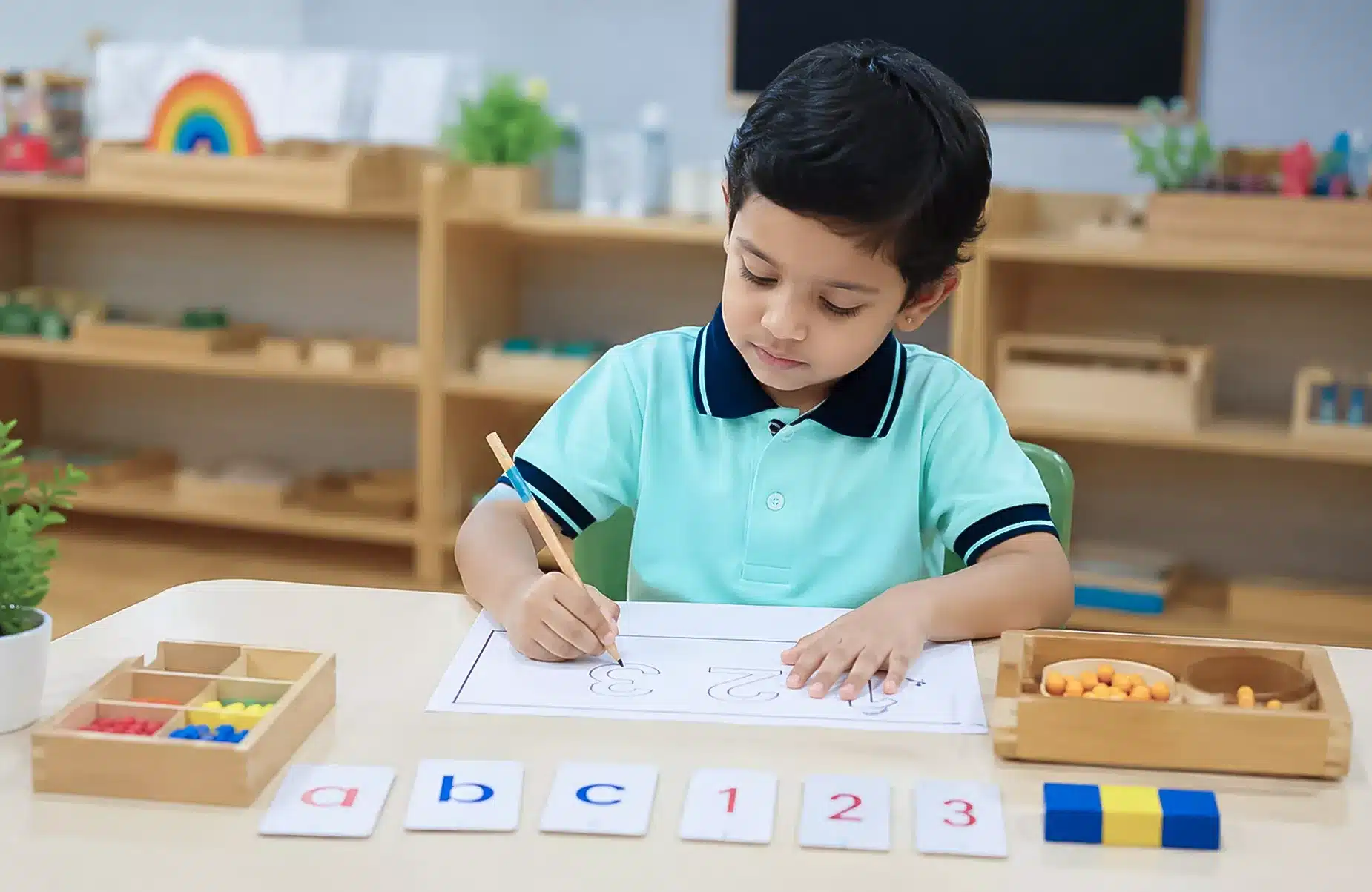 Child Developing Early Writing and Number Skills Through Guided Learning